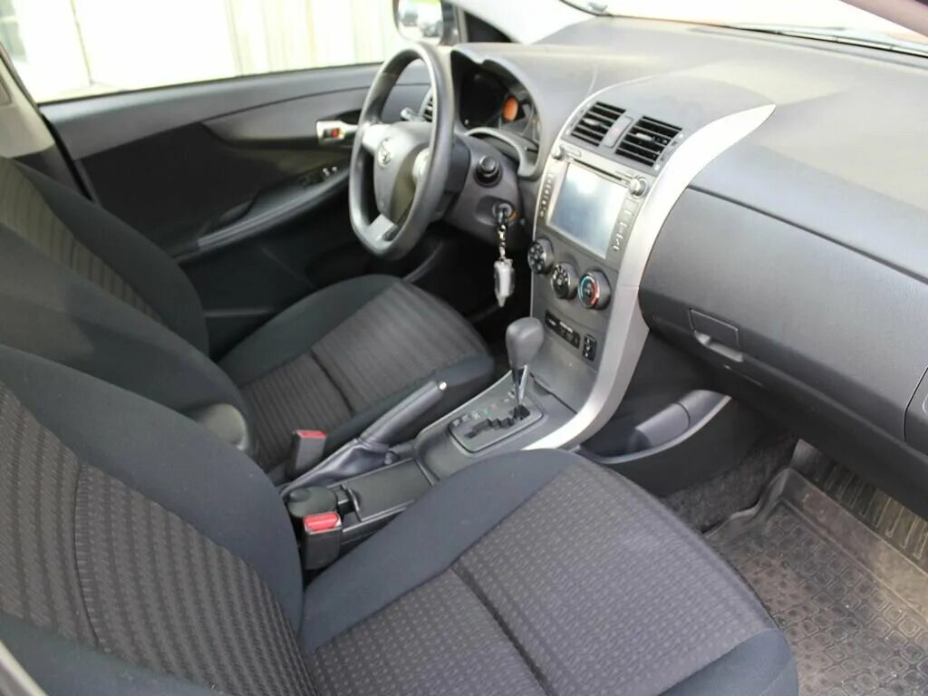 Toyota corolla e150 2007 г. Тойота королла 2011 автомат. Тойота королла 2008 салон автомат. Тойота каролла е150 салон. Тойота королла е150 автомат.