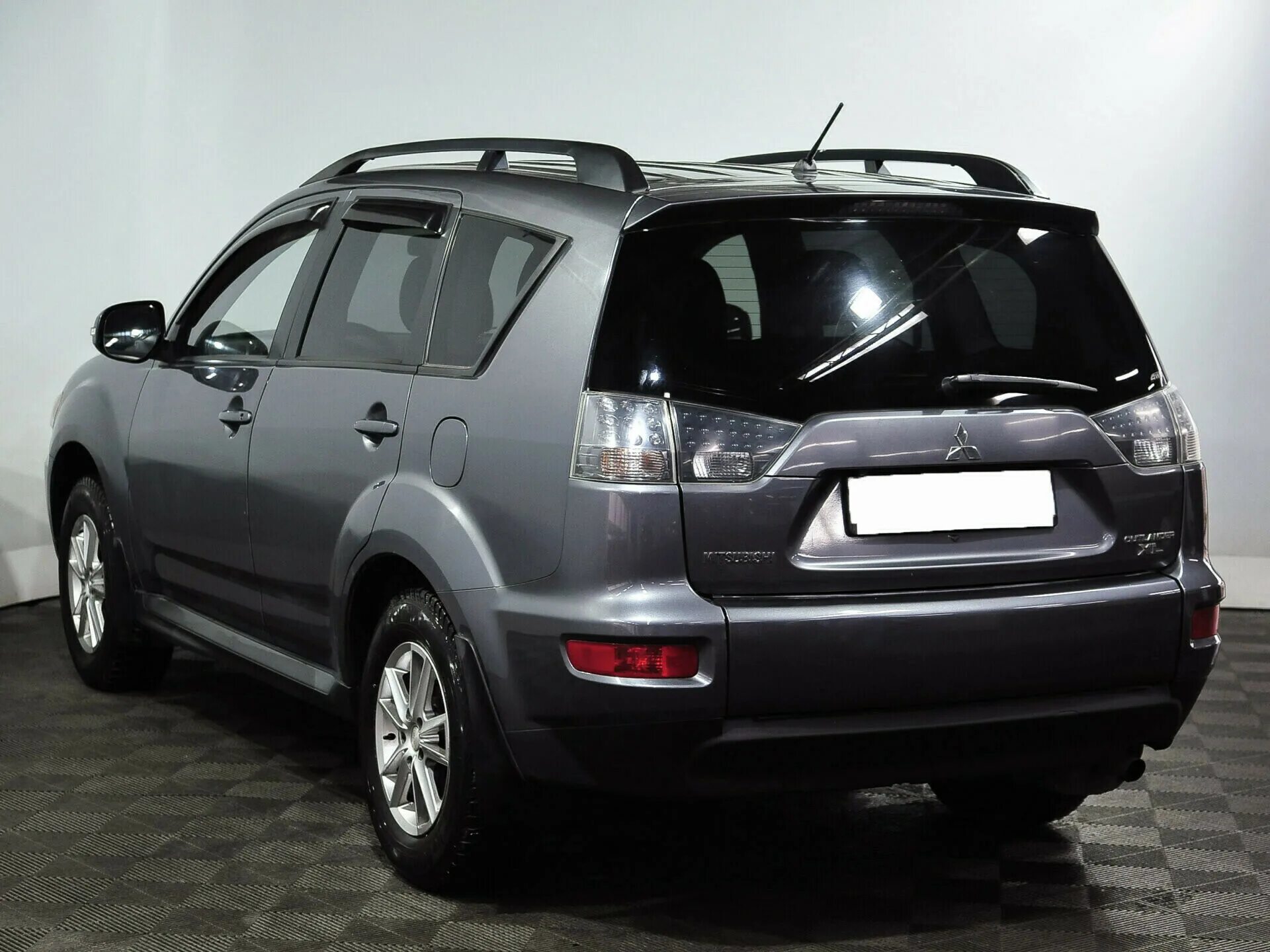 Mitsubishi outlander продажа. Mitsubishi Outlander 2010. Mitsubishi Outlander XL 2010. Mitsubishi Outlander 2. Mitsubishi Outlander 2.0 2010.