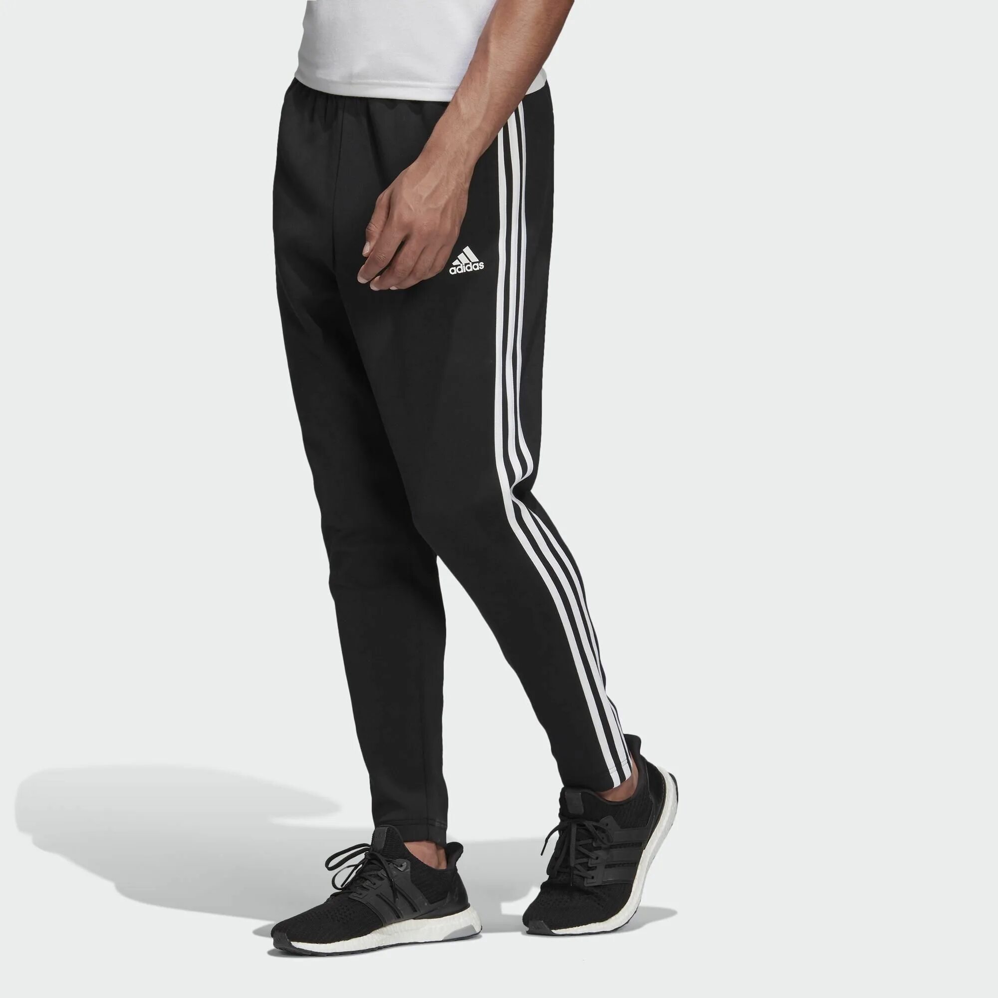Спортивное штаны купить недорого. Adidas 3 Stripes штаны. Adidas Essentials 2013 штаны. Штаны адидас мужские черные. Adidas Originals брюки спортивные 3-Stripes Cargo.