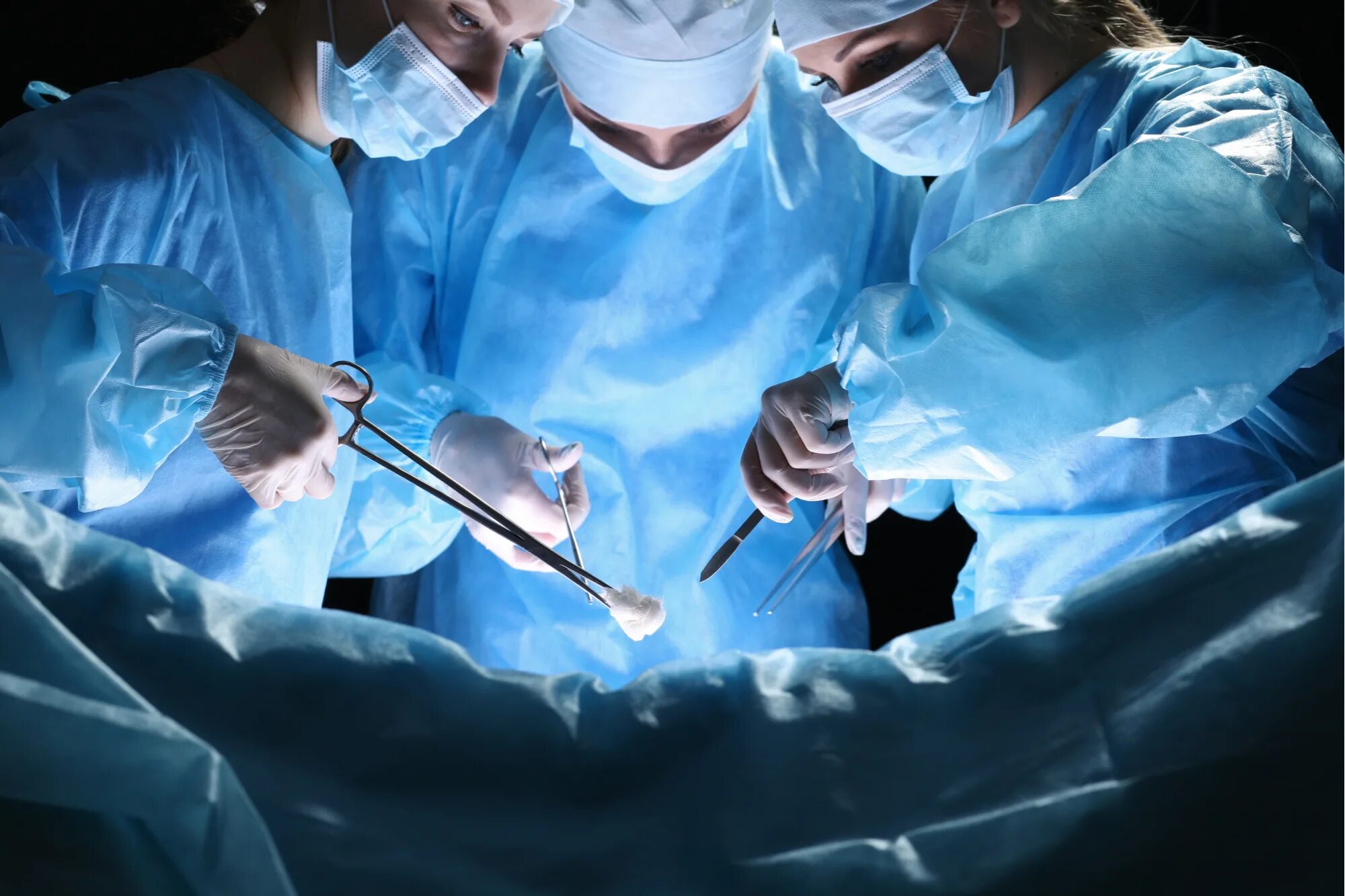 Surgeons performs operations