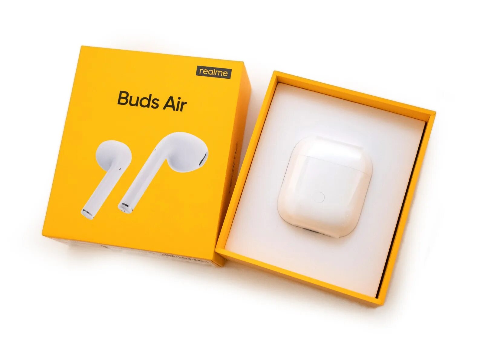 Realme buds air сравнение. Наушники Realme Buds. Беспроводные наушники Realme Buds Air 2, черный. Realme наушники Buds Air желтая коробка. Realme Buds Air.