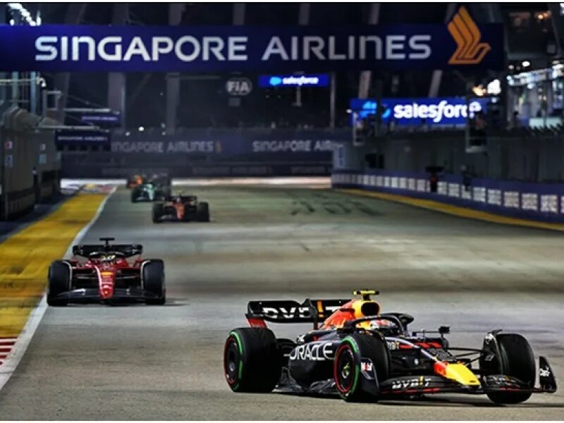 Формула 1 гран при сингапура гонка. Формула 1 Гран при Сингапура. Гран при Сингапура 2022. Феррари ф1 Сайнс. Макларен формула 1.