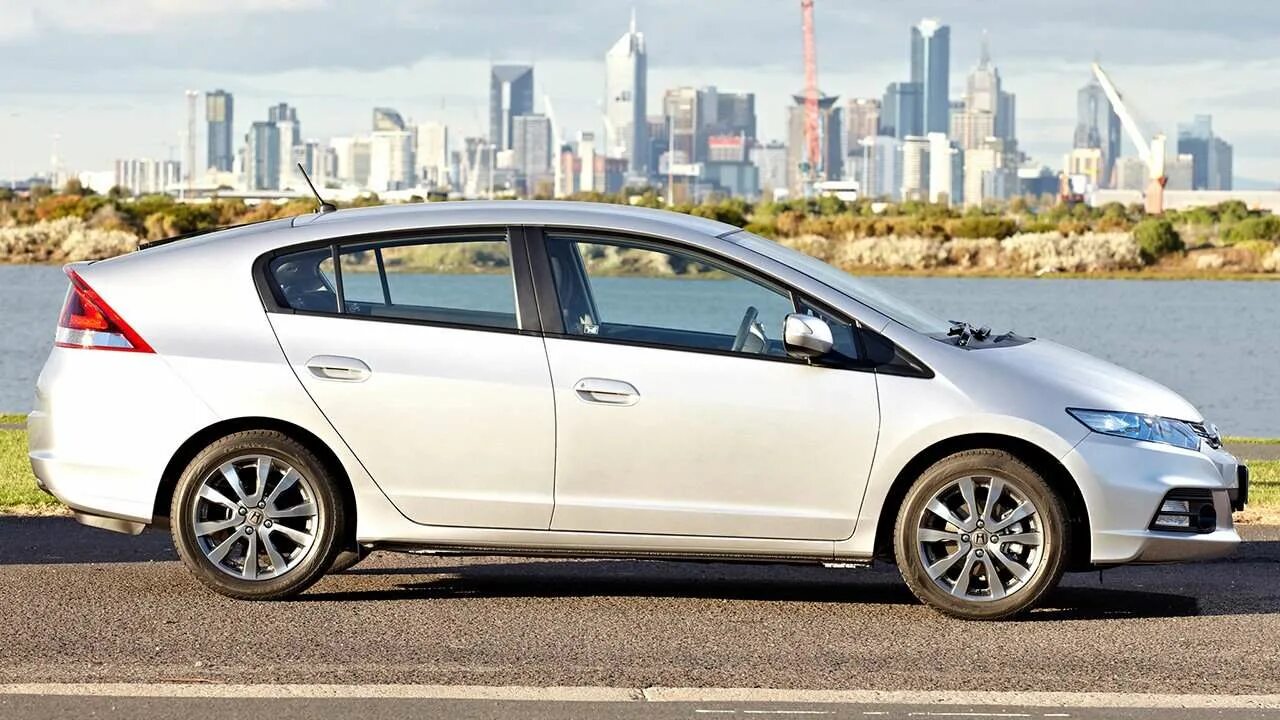 Расход инсайт. Honda insight 2012. honda insight ze2. honda insight 2009. хонда инсайт 2012г.