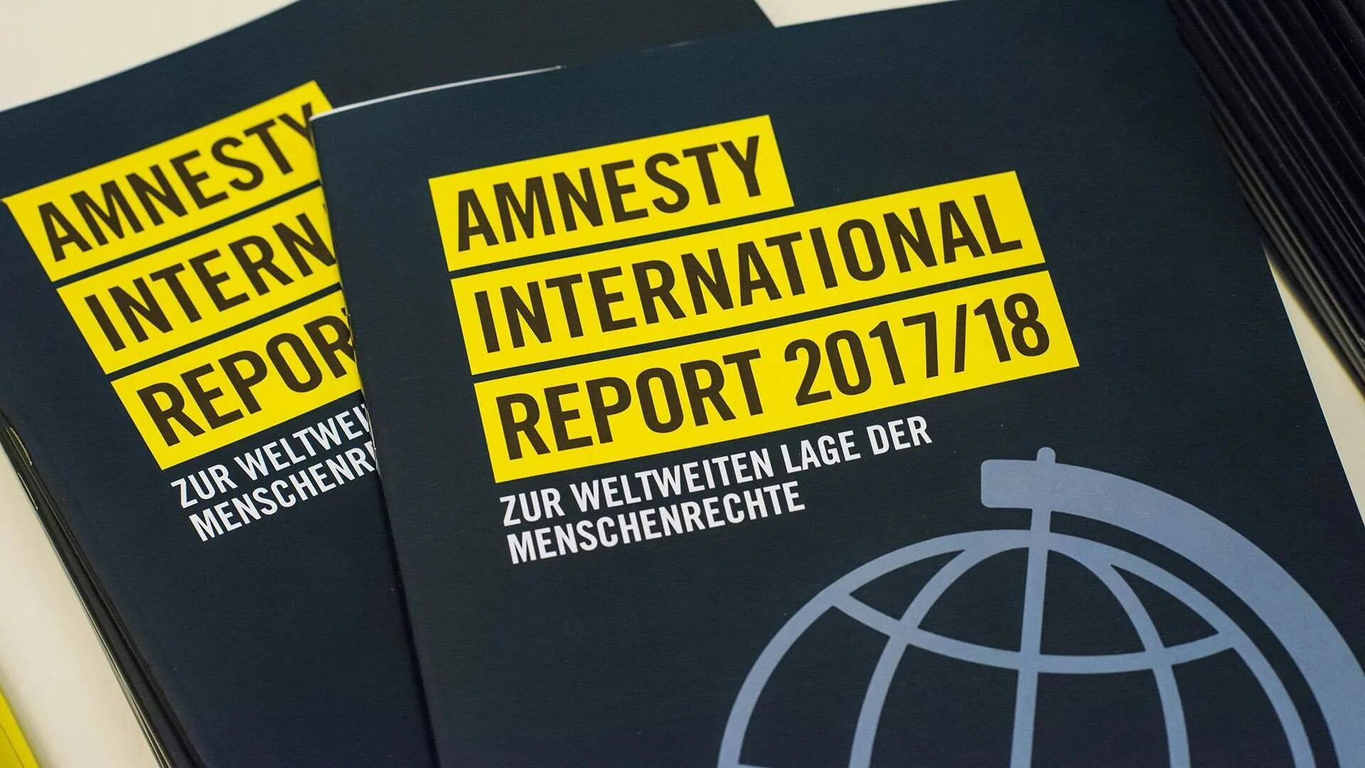 Амнистия организация. Международная амнистия доклад. Международная амнистия организация. Amnesty International. Международная амнистия читать.