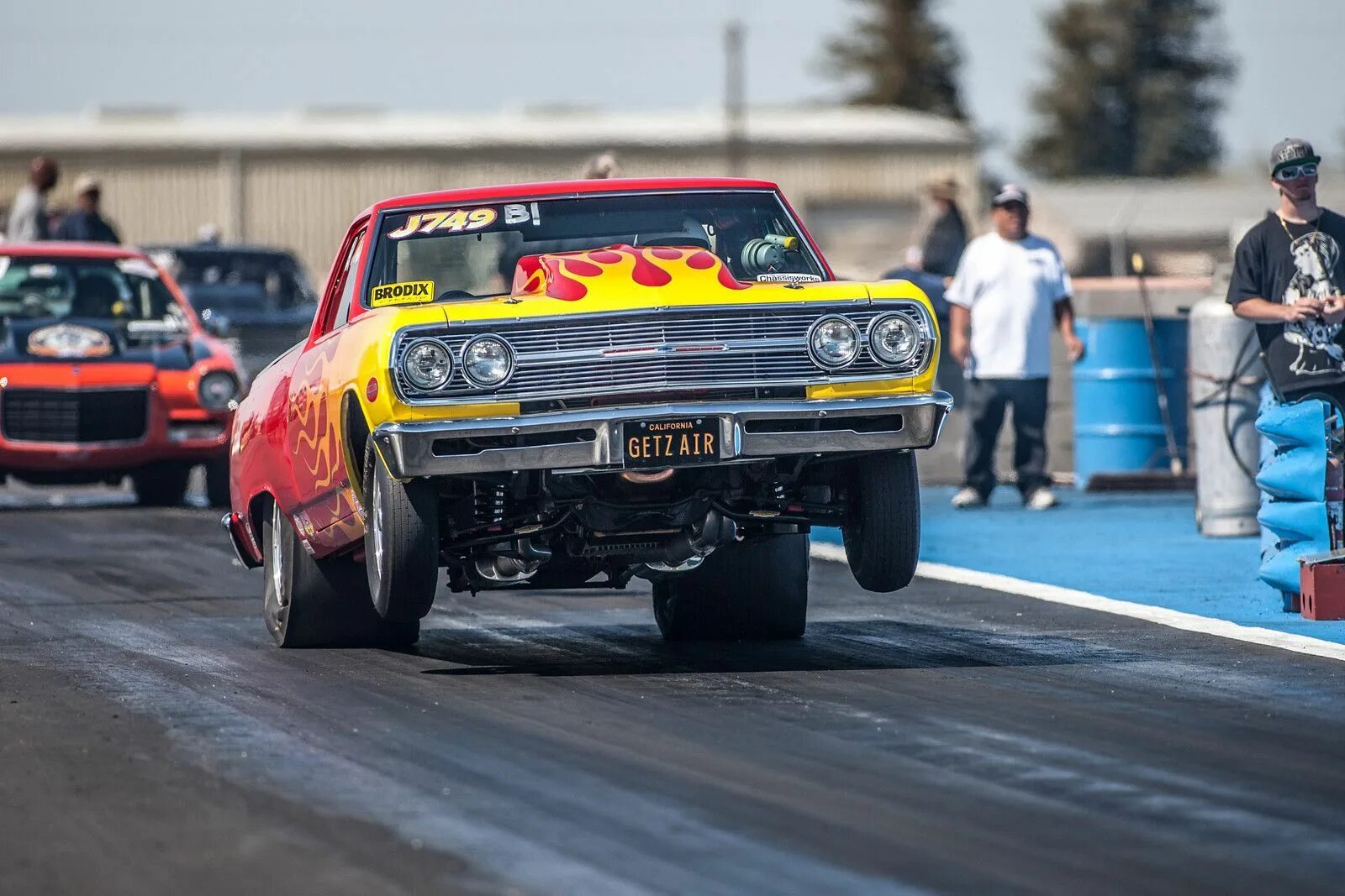 Драг рейсинг где. Машины драг рейсер. Drag Racing гонки. Автоспорт драг рейсинг. NHRA Drag Racing.