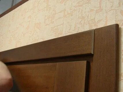 Установка дверных наличников