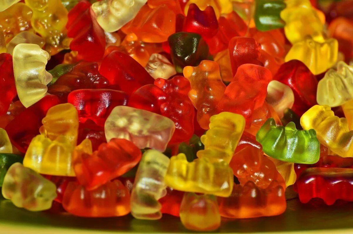 Мармелад желе. Мармеладные мишки haribo. Конфеты сосательные мишки гамми. Конфетки мармеладки. Мармеладные конфетки.