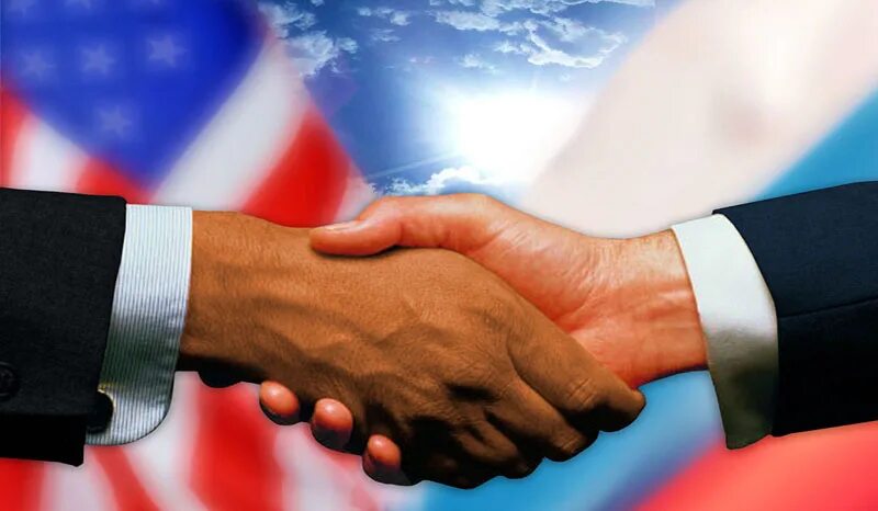 Россия в руках. Дипломатические отношения России. Дипломатические отношения в играх. Америка и Россия жмут руки.