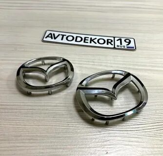 Эмблема мазда 3 руль