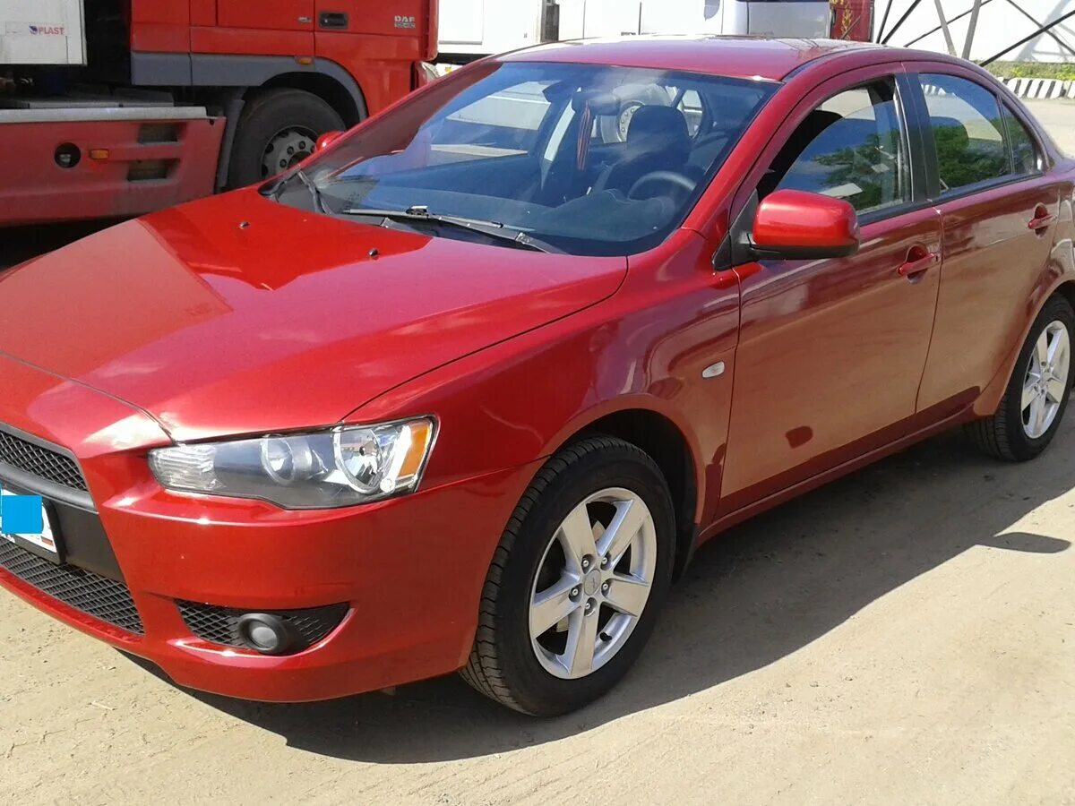 Митсубиси лансер 2010. Mitsubishi Lancer 2010. Митсубиси Лансер красный 2010. Мицубиси ланцер 2010. Mitsubishi Lancer 2010 Price.