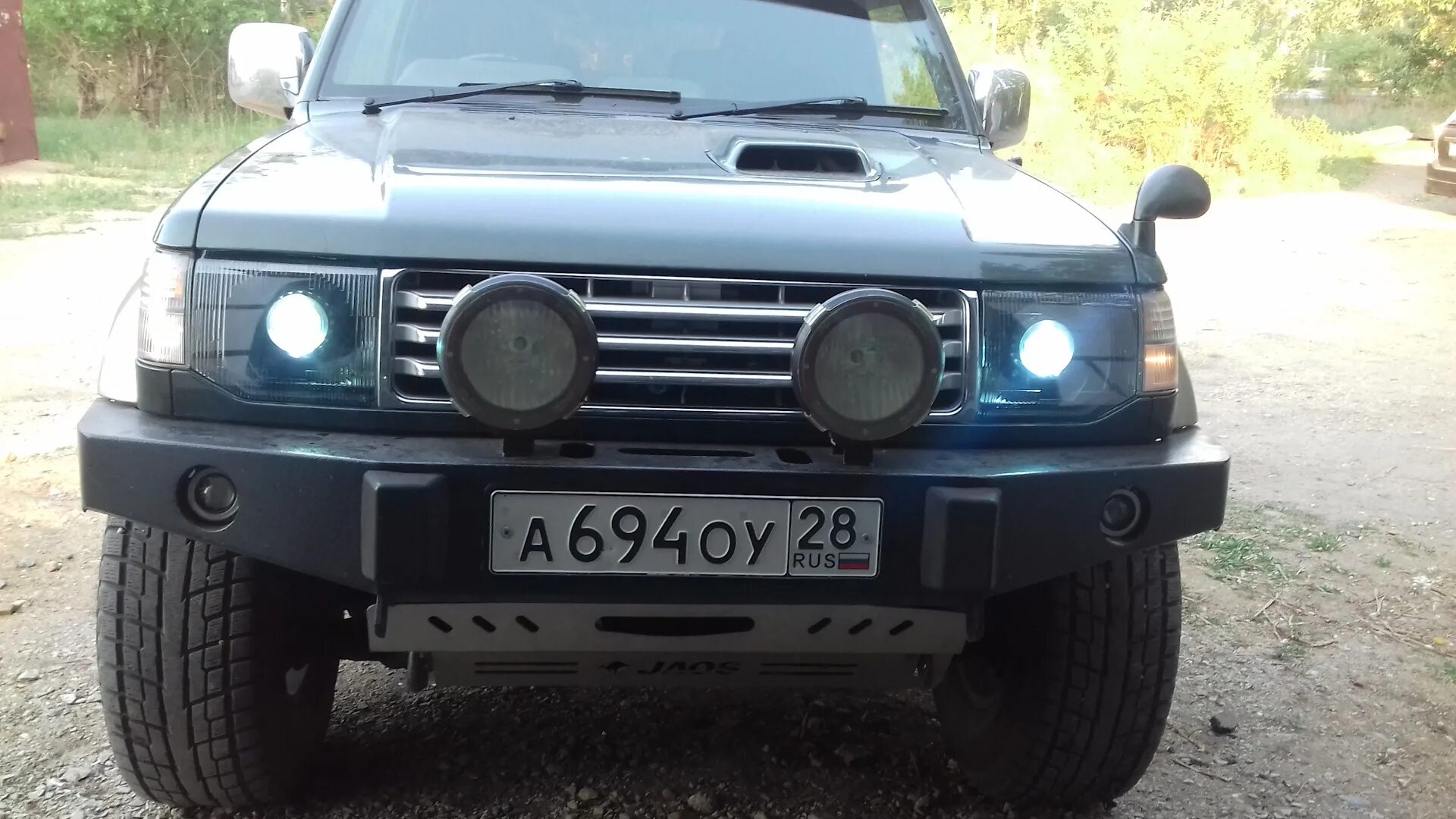 Паджеро 2 круглые фары. Фары Pajero 2. Линзы на Паджеро 2. Паджеро 2 ПТФ. Птф паджеро 2