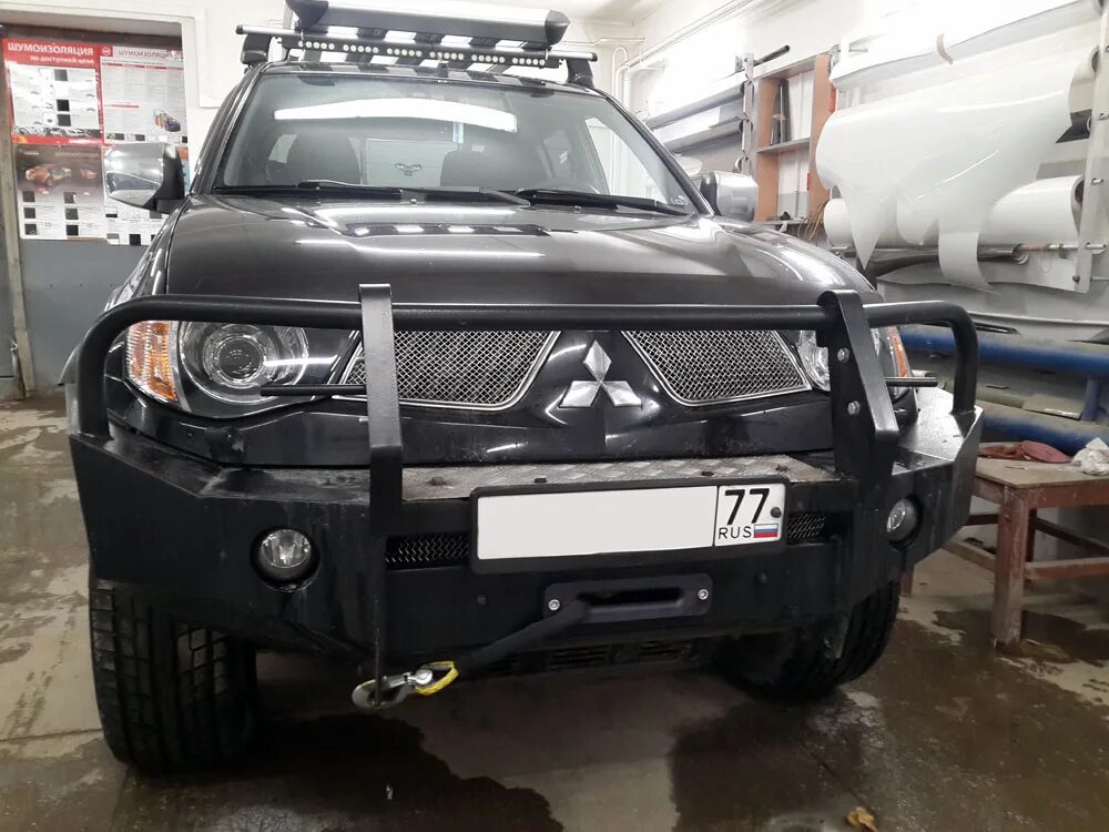 Mitsubishi l200 замена. Фара Митсубиси л200. Линзы Митсубиши l200 2012. Оптика на Mitsubishi l200 с корректором. Билед фары Митсубиси л200 2008 года.