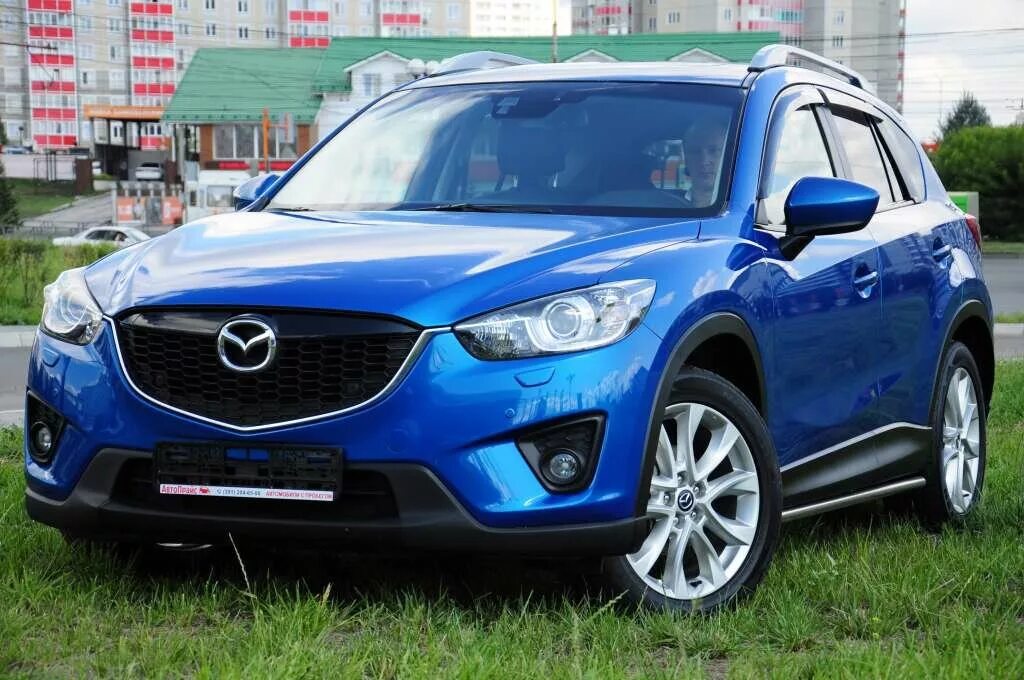 Mazda cx 5 год выпуска. Mazda CX-5 2013. Mazda CX 5 Blue. Мазда cx5 синяя. Mazda CX 5 2015 голубая.