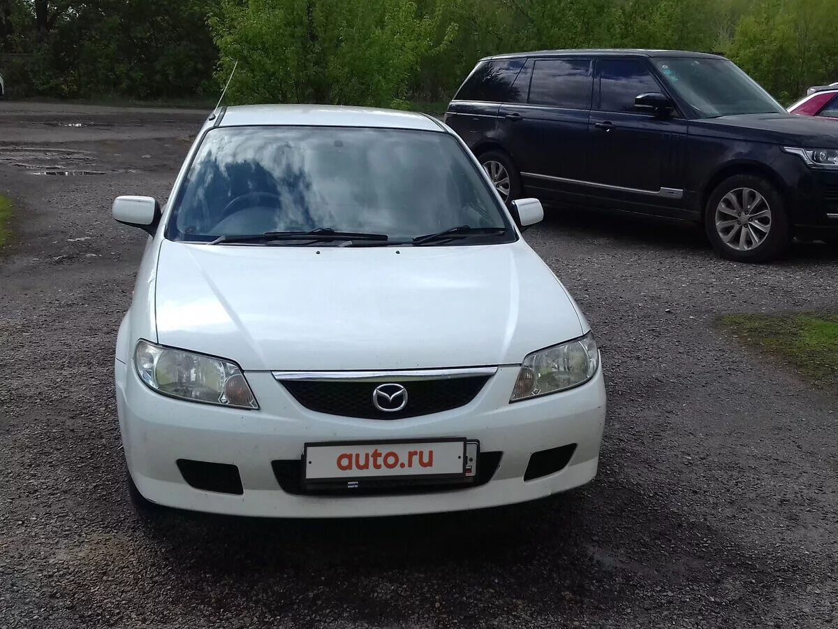 Mazda familia 2000. Mazda familia 2000 черная. мазда фэмили 2000 год. Mazda familia 2000 седан. Mazda familia 2000 год.