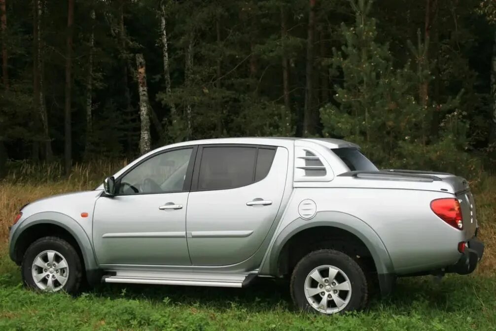 Mitsubishi l200 2008. Мицубиси л200 2008. Mitsubishi l200 2.5 2008. Mitsubishi l200 2008 года. Митсубиси л200 2008 года.