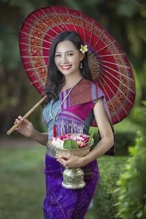 AW7A1761 Beautiful Laos girl in costume, Asian woman weari. 