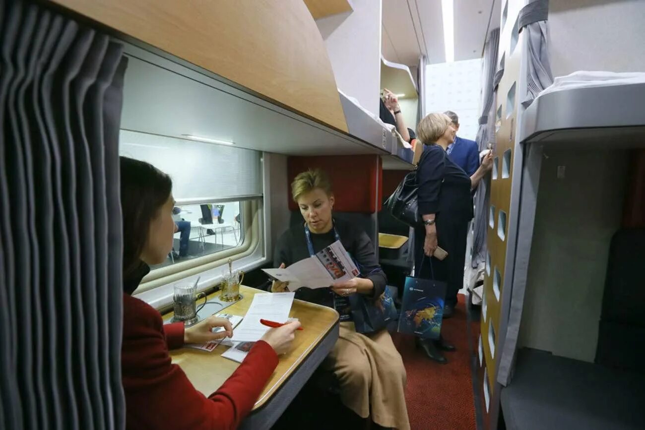 Пассажиры поездов дальнего следования ржд. Вагон фпк плацкарт 3б. новый вагон ржд плацкарт 3э. вагон 3э плацкарт что это. вагон 3э плацкарт ржд.