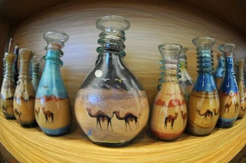 Glass made from sand. Бутылочка с песком. Картины из цветного песка в бутылке. Рисование песком в бутылке. Сувениры с песком.