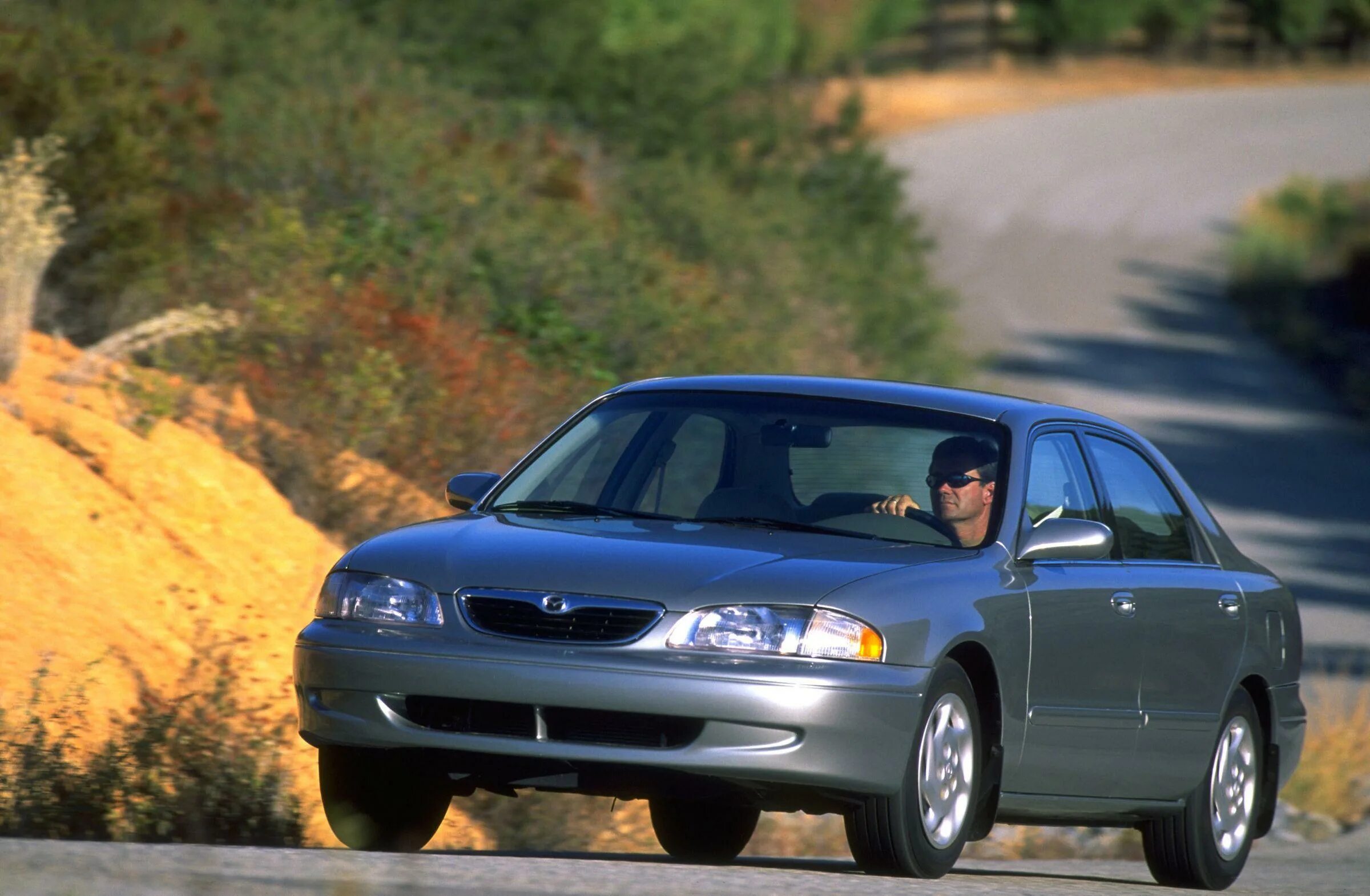 Мазда 626 2000 года. Mazda 626 USA. Мазда 626 USA 1997. Mazda 626 2002. Мазда 626 1997-2002 USA.