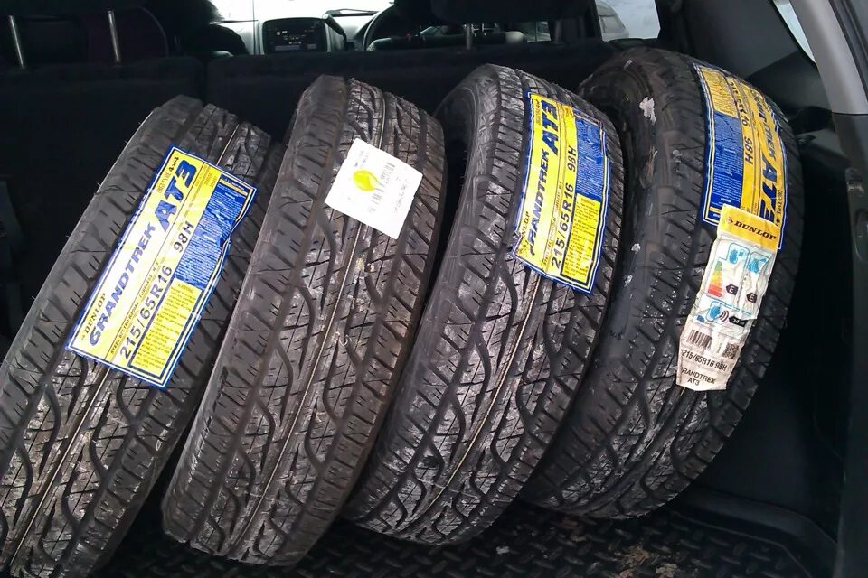 215 65 r17 летние купить. Dunlop 215/65 r16. Dunlop Grandtrek at3 215/65 r16. Dunlop Grandtrek at5. Данлоп 215/65/16 h 98 Grandtrek at5.