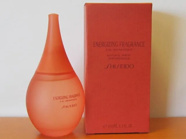 Шисейдо оранжевый флакон. Шисейдо оранжевые духи. Shiseido Energizing. Shiseido Energizing Fragrance. Купить духи шисейдо