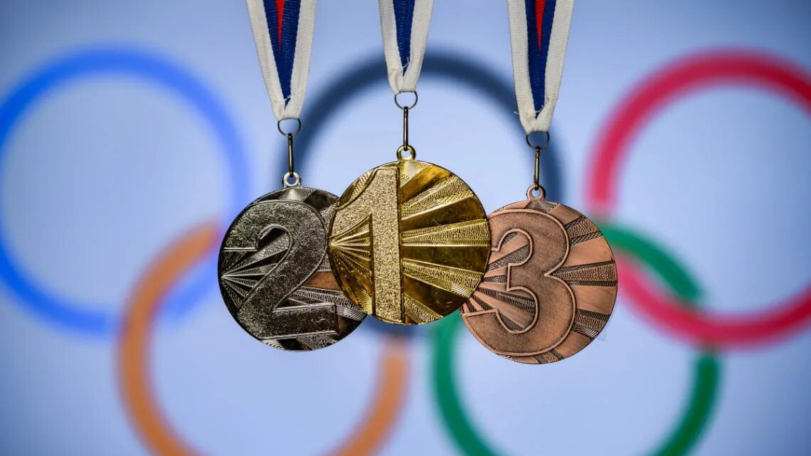 Олимпийские медали. Медали олимпиады. Награды Олимпийских игр. The most medals
