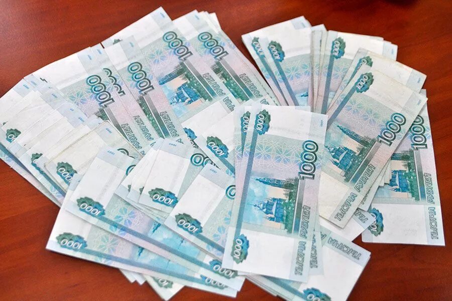 Тысяча рублей россия. Деньги 1000 рублей. Тысячные купюры. Деньги рубли. Купюра 1000.