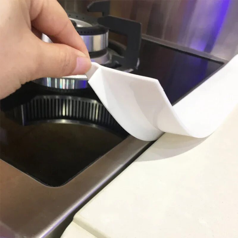 Вставка газовой плиты. Silicone stove counter gap cover. силиконовая уплотнительная лента термостойкая для плиты. силиконовая вставка для плиты. силиконовая кухонная вставка для плиты.