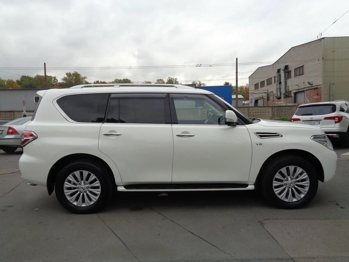 Патрол 2015. Ниссан патрол 2015. ниссан патрол 2015 белый. ниссан патруль 2015. nissan patrol 2014.