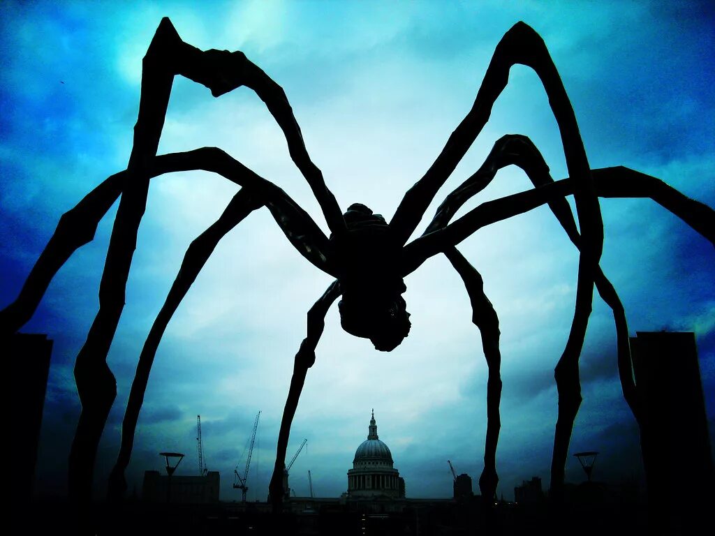 Паук над человеком. Гигантский паук. Фантастические гигантские пауки.