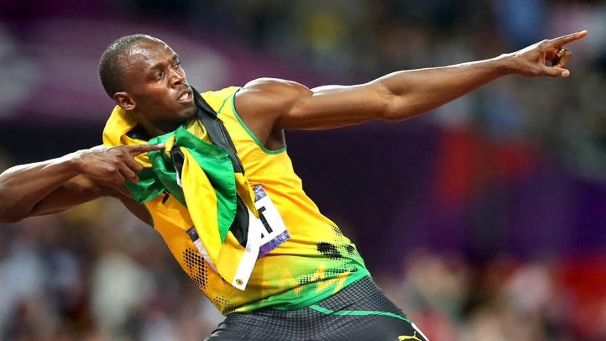 Бегун рекордсмен чемпион. Usain Bolt. Усейн болт футбольная карьера. Усэйн болт поза.