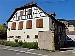 Фасад из мезон волна пример. The window in the attic. Maison 20. Lons-le-saunier франция. Eschborn город.