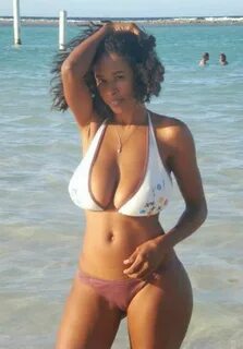 amateur beauty with big naturals and cleavage in a bikini non-nude. 