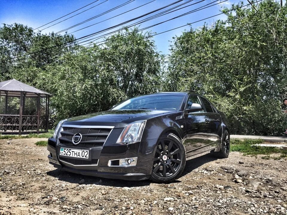 Едет черный кадиллак. Cadillac CTS 3.6 2014. Cadillac CTS 2. Cadillac CTS 2 2.8. Кадиллак CTS джип.