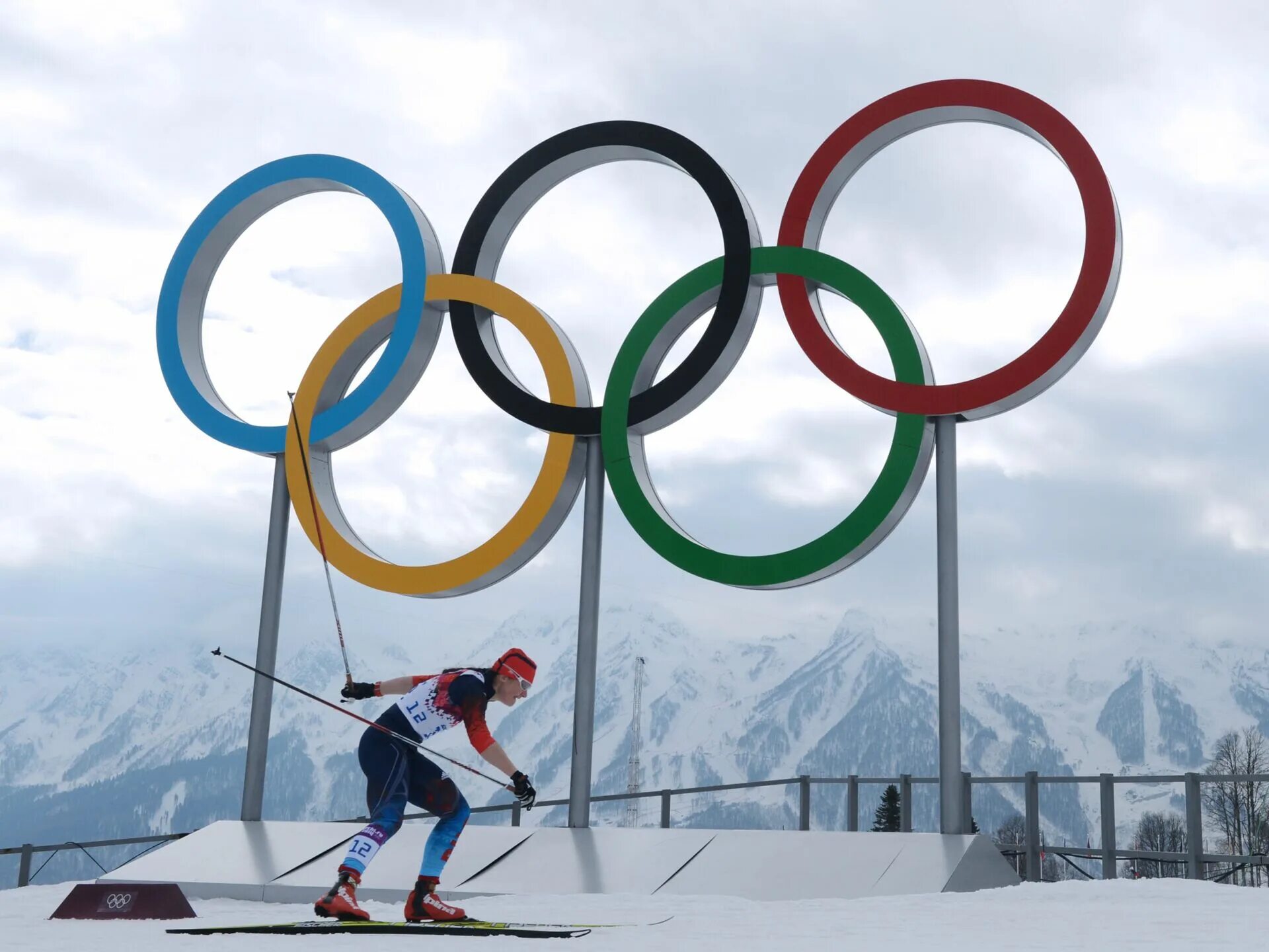 Олимпийская игра 9 букв. Олимпийские игры лыжи. Зи ние Олимпийские игры.
