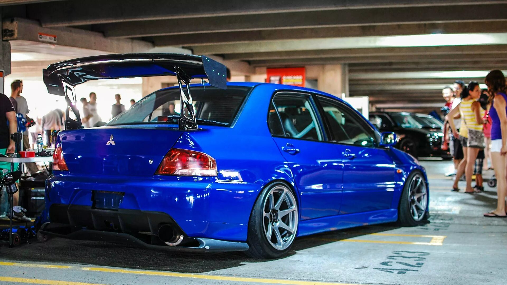 Авто из японии с 1 апреля. Mitsubishi Lancer 7 stance. Mitsubishi Lancer EVO 7 stance. Ланцер 9 синий стенс. JDM Mitsubishi Lancer Evolution 9 Blue.