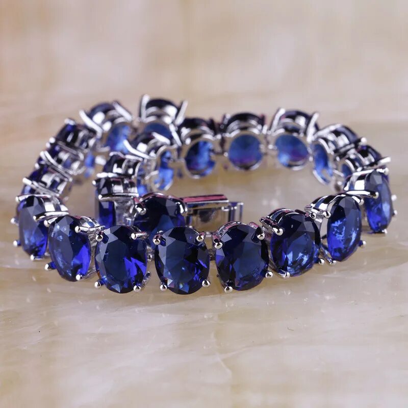 кольцо танзанит сапфир. сапфир в украшениях фото. сапфир кашмирский перстень. кольцо с синим камнем. украшения с сапфиром.