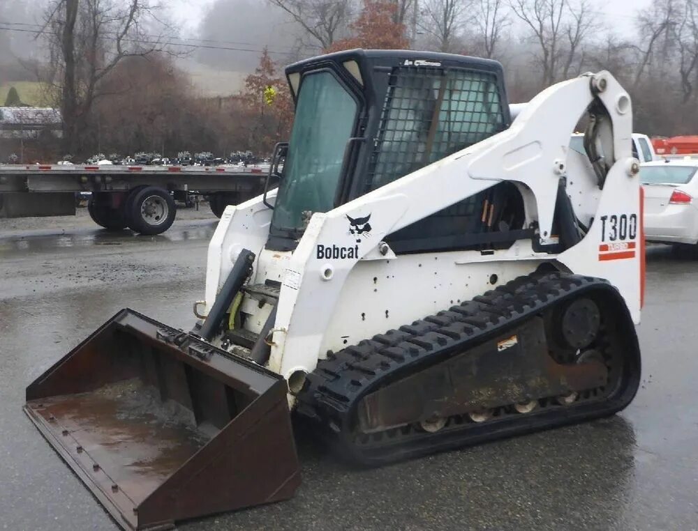 Ремонт bobcat. Bobcat t300. Dozer Bobcat t300. Bobcat t190 распределитель. Мульчер-кусторез Bobcat t870.