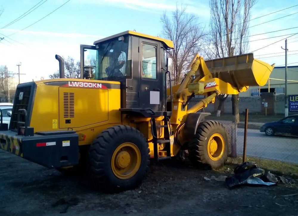 Погрузчик xcmg lw 550. Lw 550 погрузчик. Xcmg 300fn. Xcmg zl50. Погрузчик фронтальный xcmg модель lw300fn.