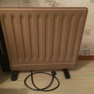 Старый масляный обогреватель