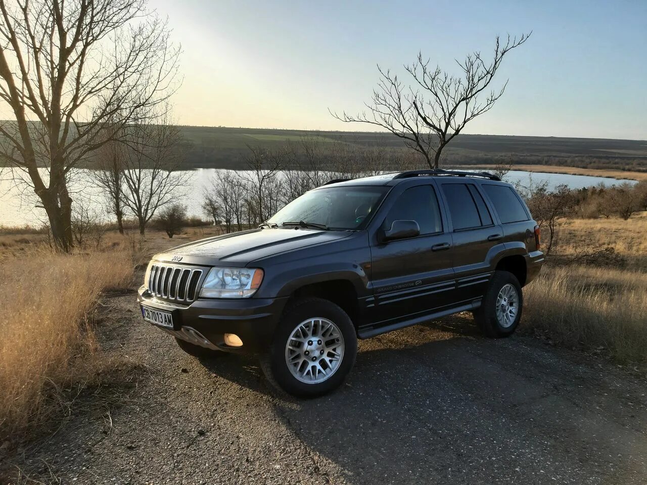 Джип гранд чероки ларедо 2013. Jeep grand cherokee 2003. Джип чероки 2003. Jeep grand cherokee 10. Grand cherokee 2003.