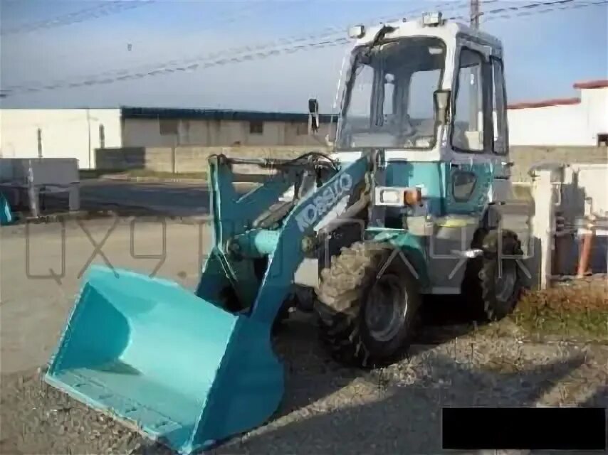 Kobelco lk40z. Фронтальныипогрузчиккабелко. Kobelco lk40z-3. Мини погрузчик Кобелко.