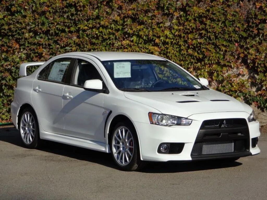 Митсубиси Лансер 10. Mitsubishi Lancer 2014. Lancer Mitsubishi Lancer. Мицубиси Лансер Эволюшн 2014.