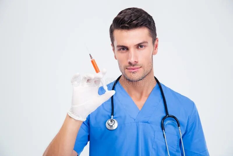 Free Photo Front view male doctor in medical suit and mask against coronavirus h
