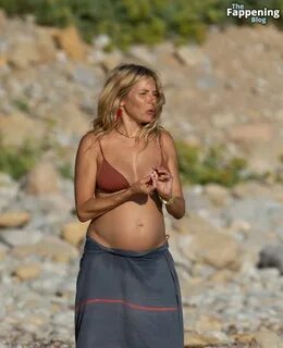 Pregnant Sienna Miller Splashes in the Waves in Ibiza (105 Photos) .