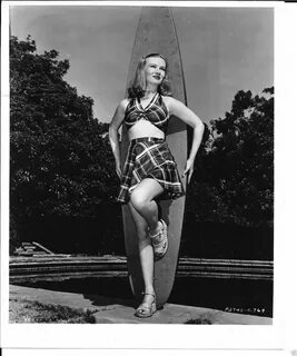 Veronica Lake in swimsuit poolside, 1946. 