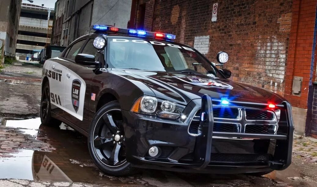 Полицейские машины в америке. Полицейский Додж Чарджер в США. Dodge Charger 2013 Police. Додж Charger 2013 Police. Dodge Charger 2014 Police.