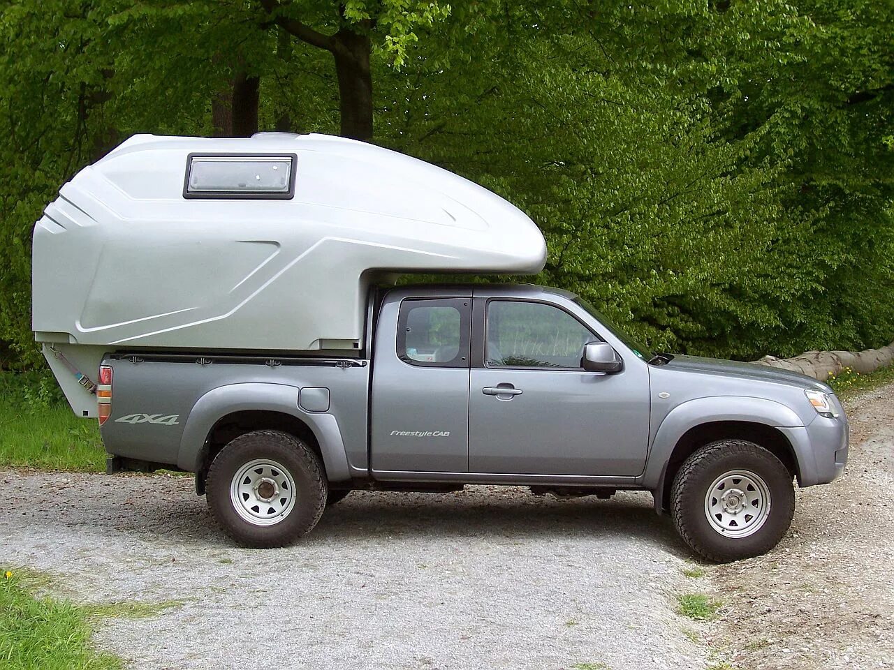 Дом на пикап. Mazda bt50 Camper. Жилой модуль для пикапа bt50. Жилой модуль для Nissan Navara. Форд рейнджер 2008 с жилым модулем.