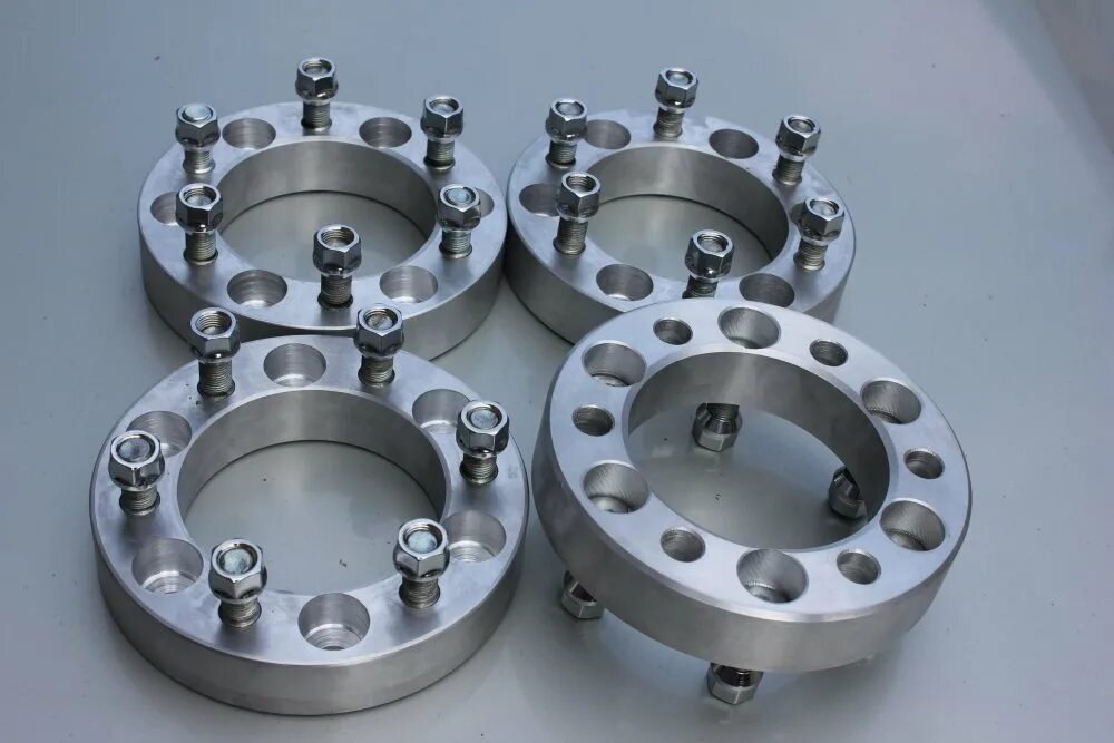 проставки алюминиевые или полиуретановые. проставки алюминиевые или полиуретановые. металлические проставки мерседес w210. проставки королла 124 кузов. проставки для колесных дисков 6х139.