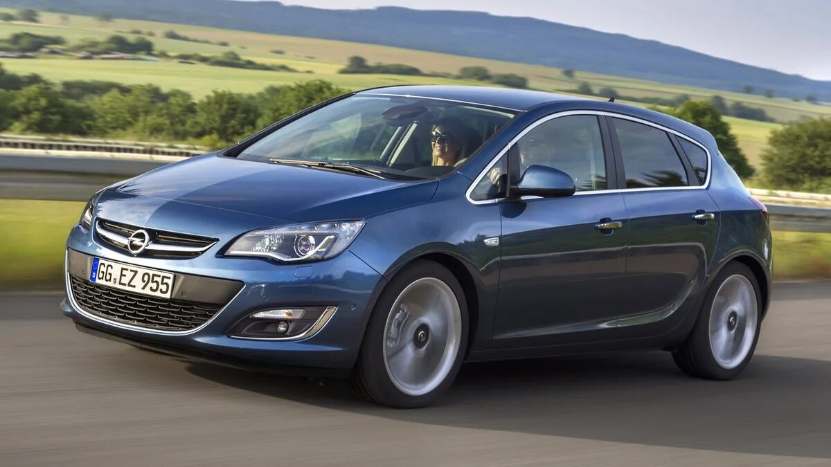 Как работает хэтчбек. Opel Astra j. Opel Astra Hatchback. Opel Astra 2013. Opel Astra 2012.